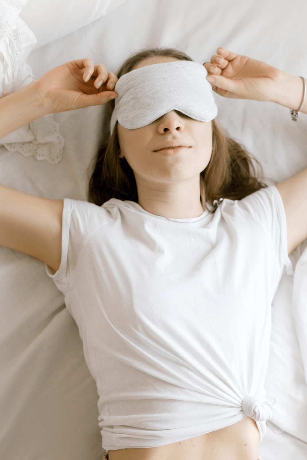Woman sleeping with an eye mask on