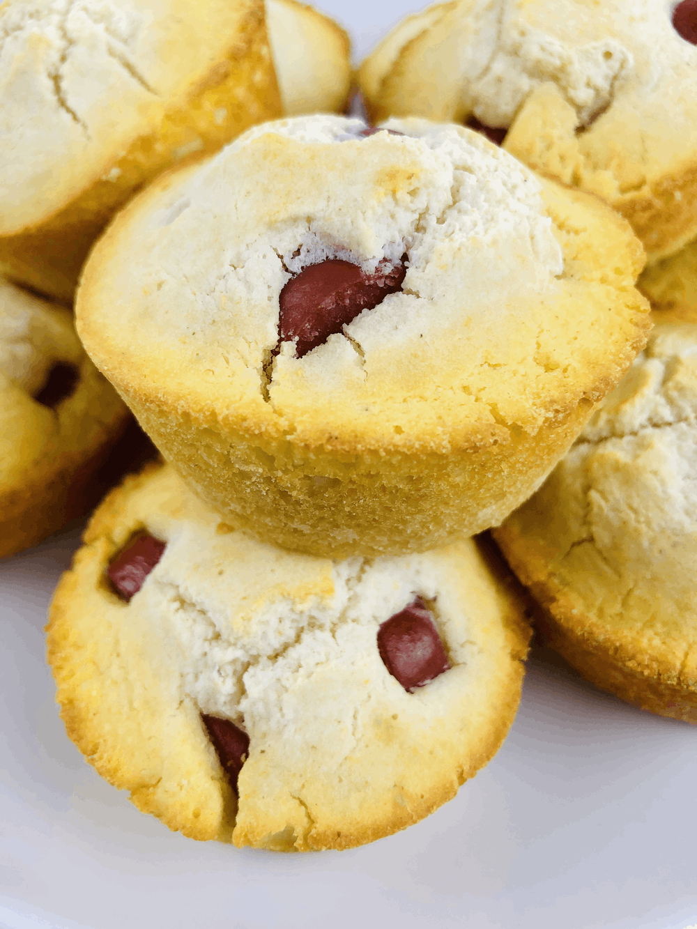 Closeup shot of corn dog muffins stacked atop one another. 