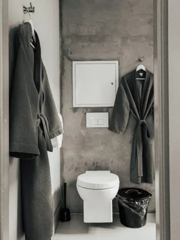 robes hanging in a bathroom