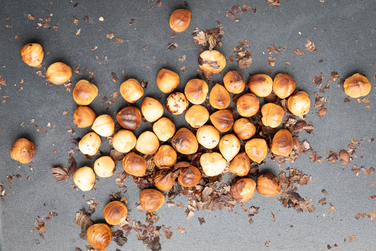 Overhead shot of roasted hazelnuts.