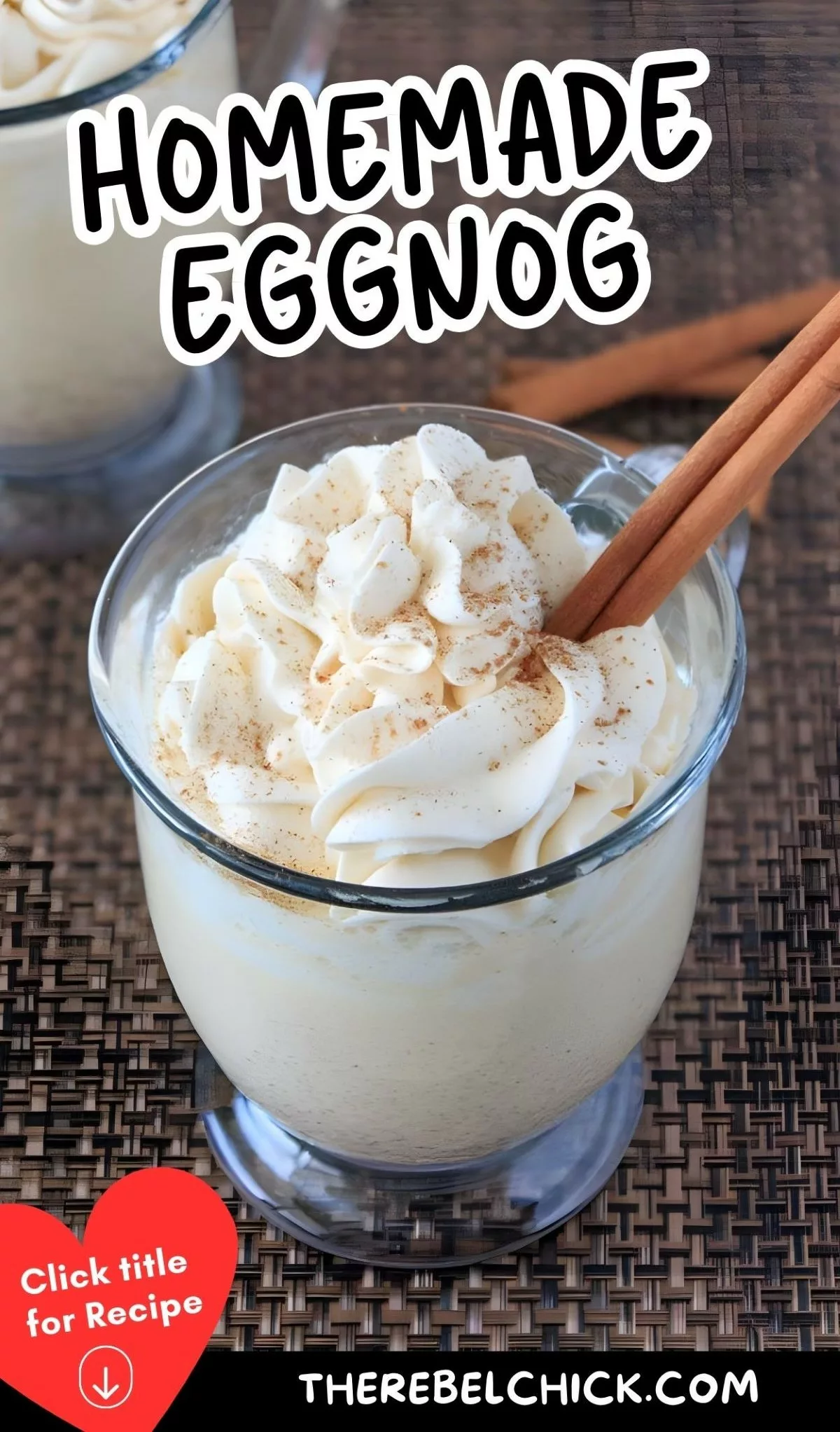 Eggnog in a glass with whipped cream on top, sprinkled with cinnamon and garnished with cinnamon sticks