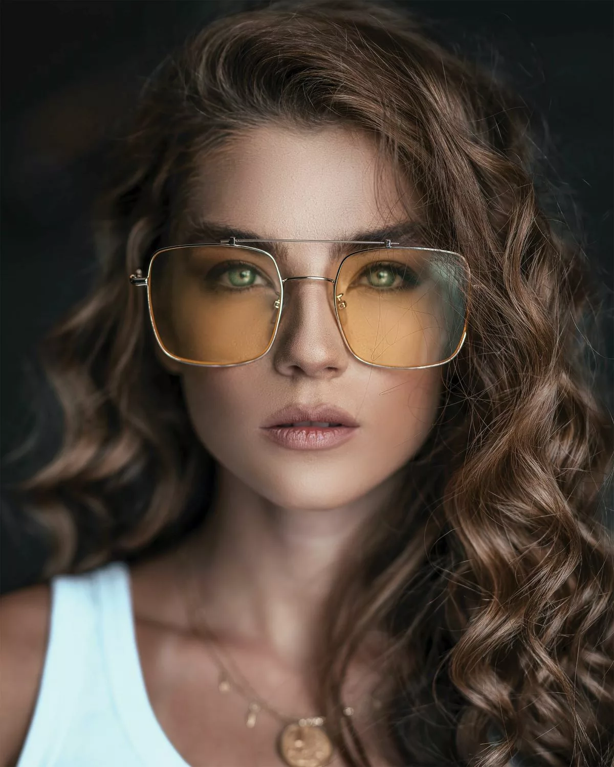 woman in glasses with colorful lenses