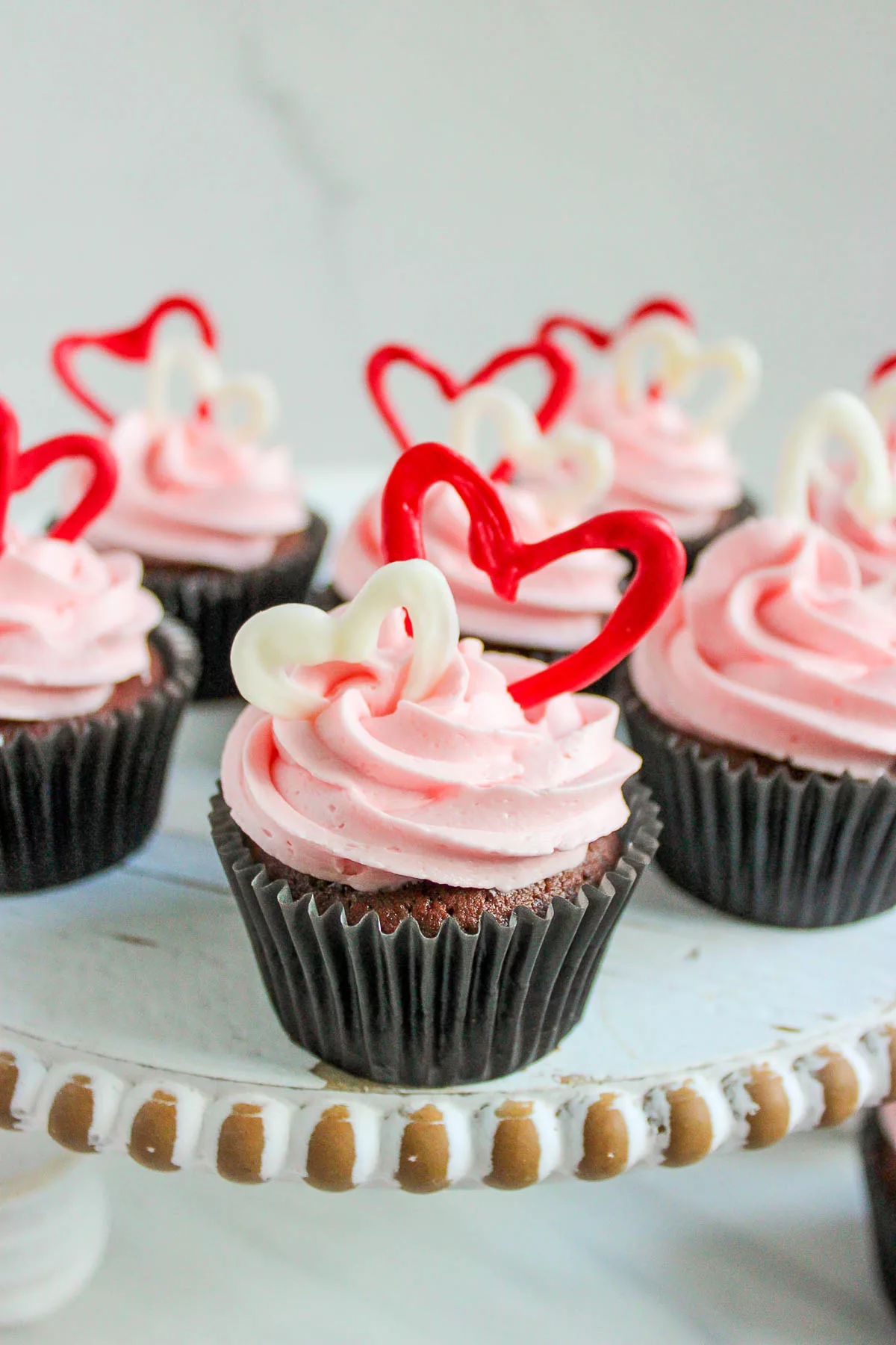 Chocolate cupcakes with pink buttercream frosting 