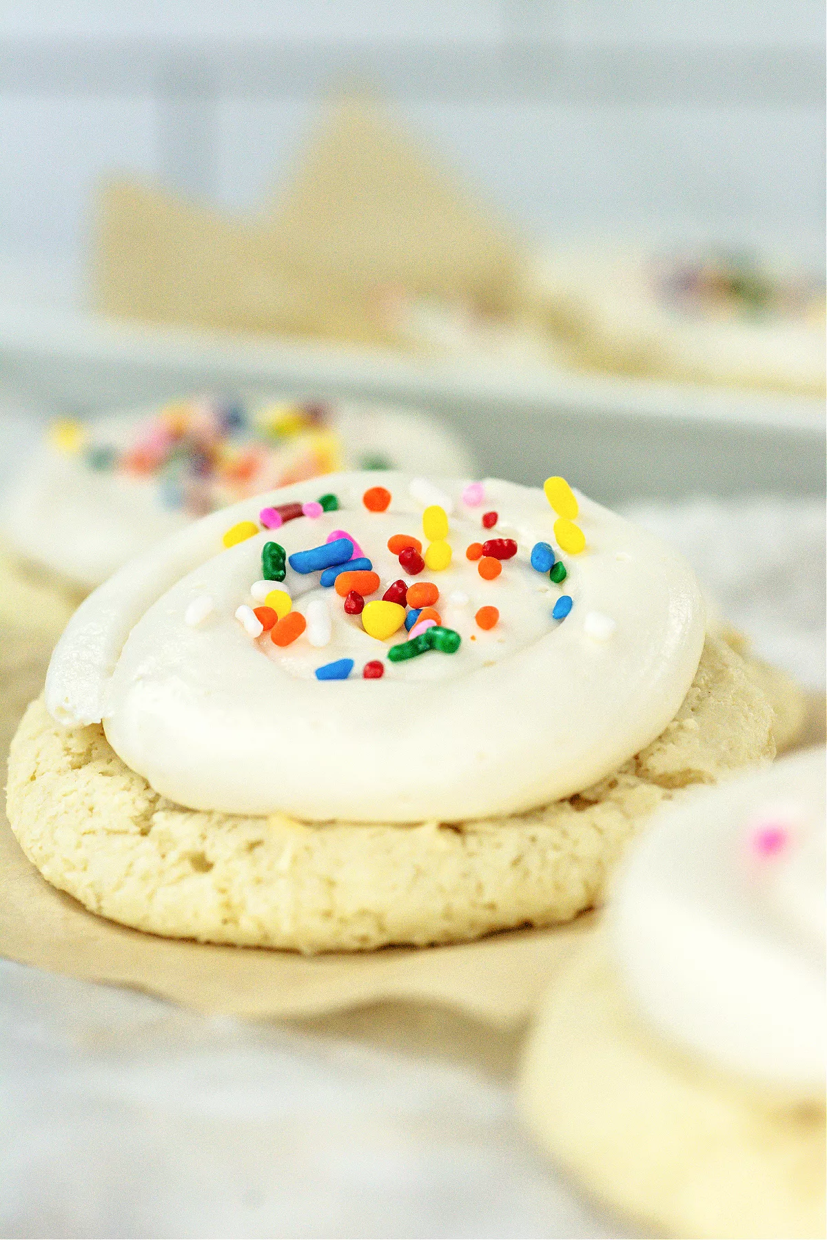 Cookies with frosting and sprinkles on top