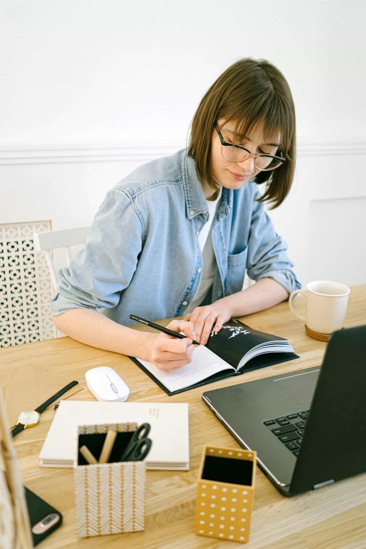 woman working at her in desk in her home office