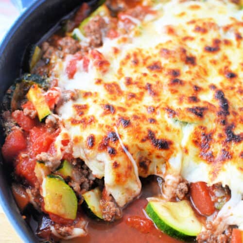 Zucchini Ground Beef Casserole topped with melted cheese