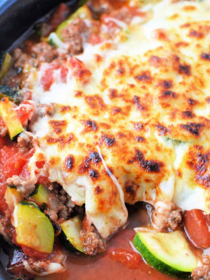 Zucchini Ground Beef Casserole topped with melted cheese