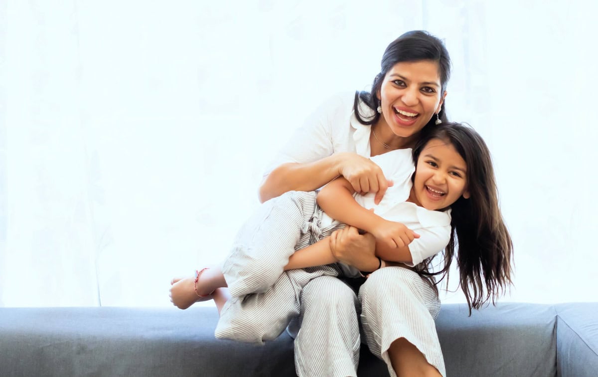 mom and daughter in matching outfits