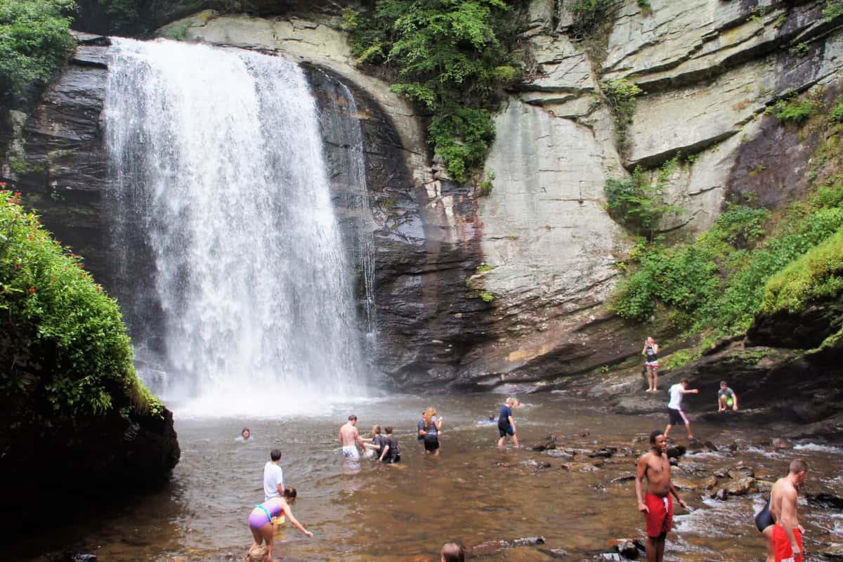 Kids playing at Looking Glass Falls in Pisgah National Forest North Carolina