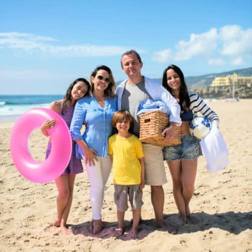 family on the beach on summer vacation