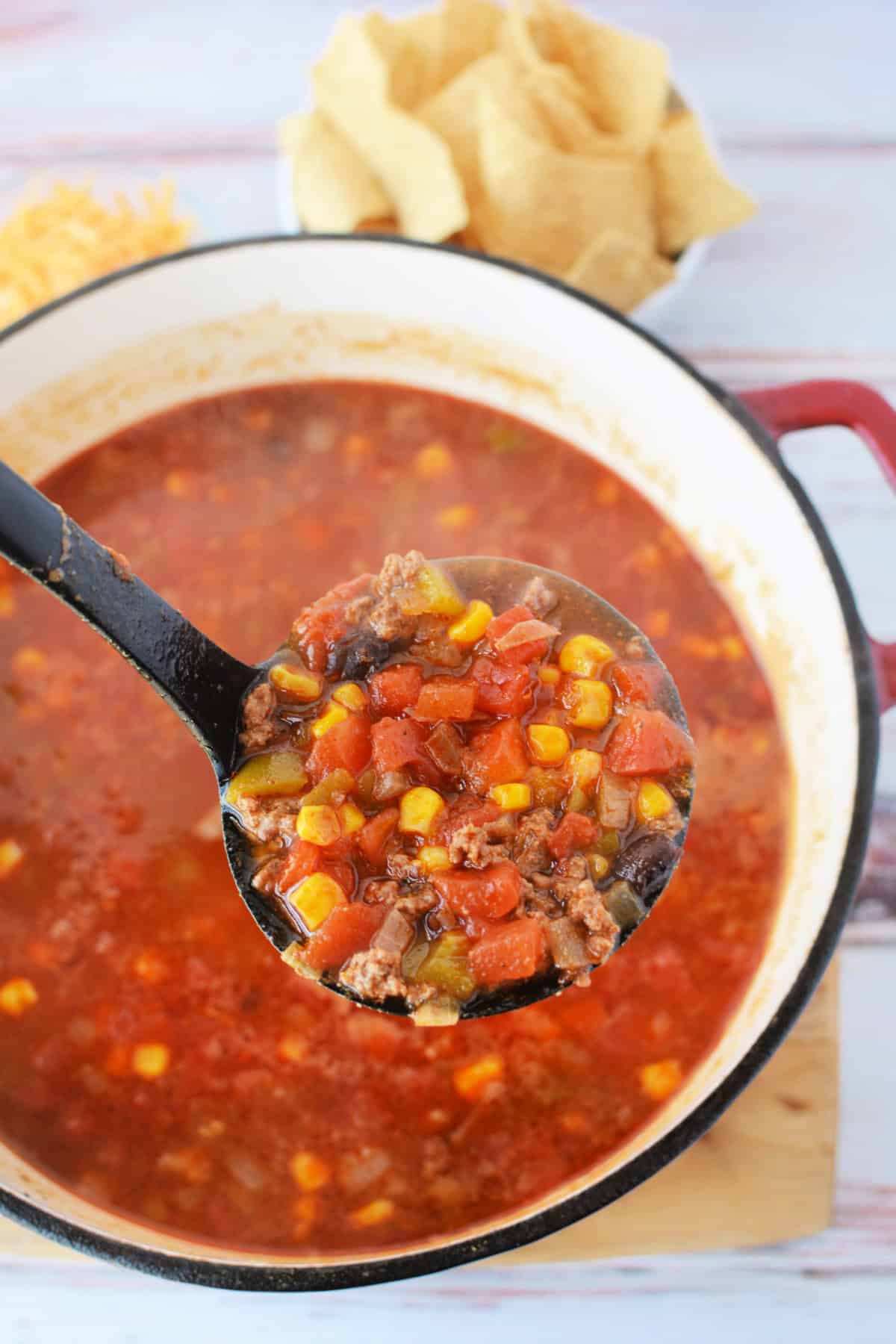 close up shot of soup on a ladle