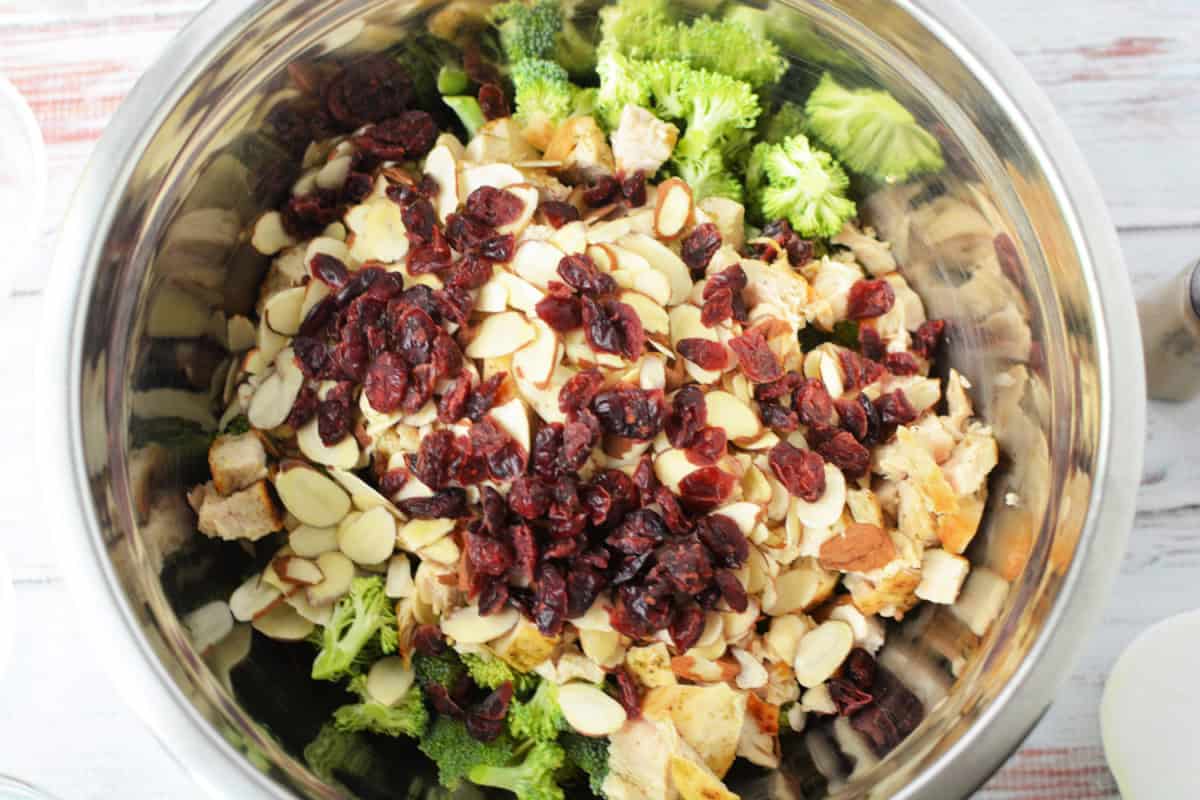 close up shot of Broccoli Chicken Salad in a mixing bowl