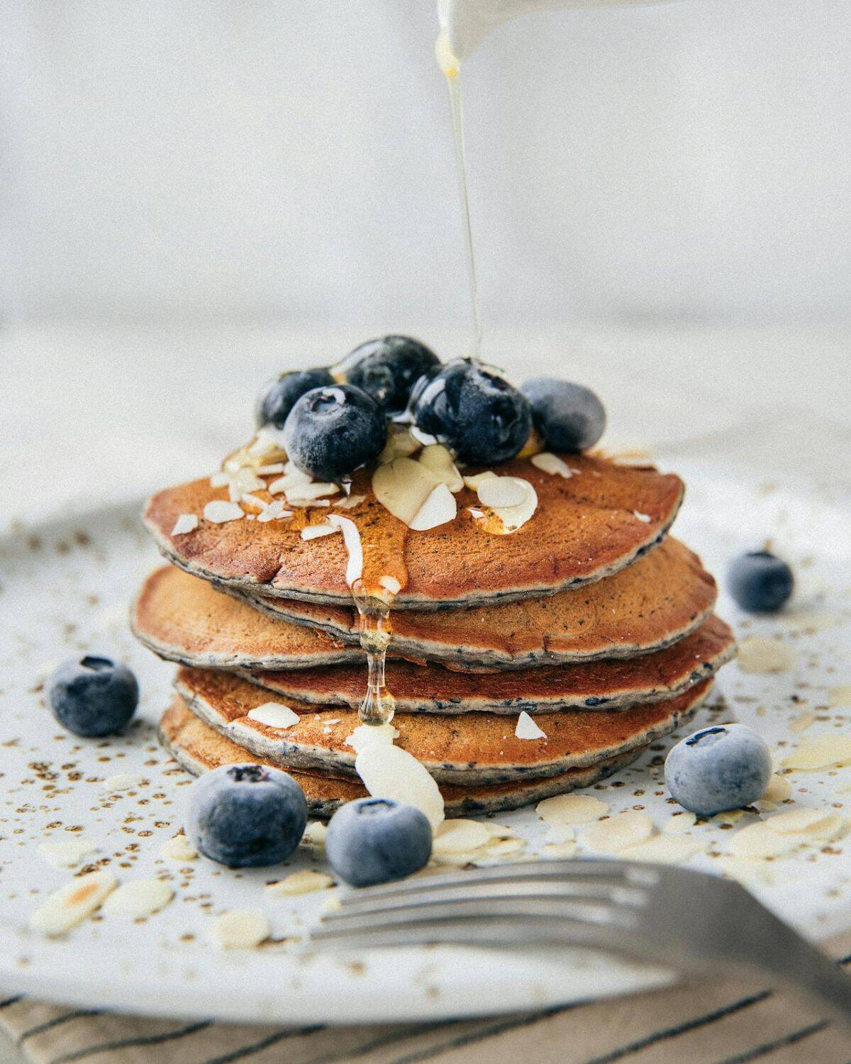 sourdough pancakes topped wit blueberries