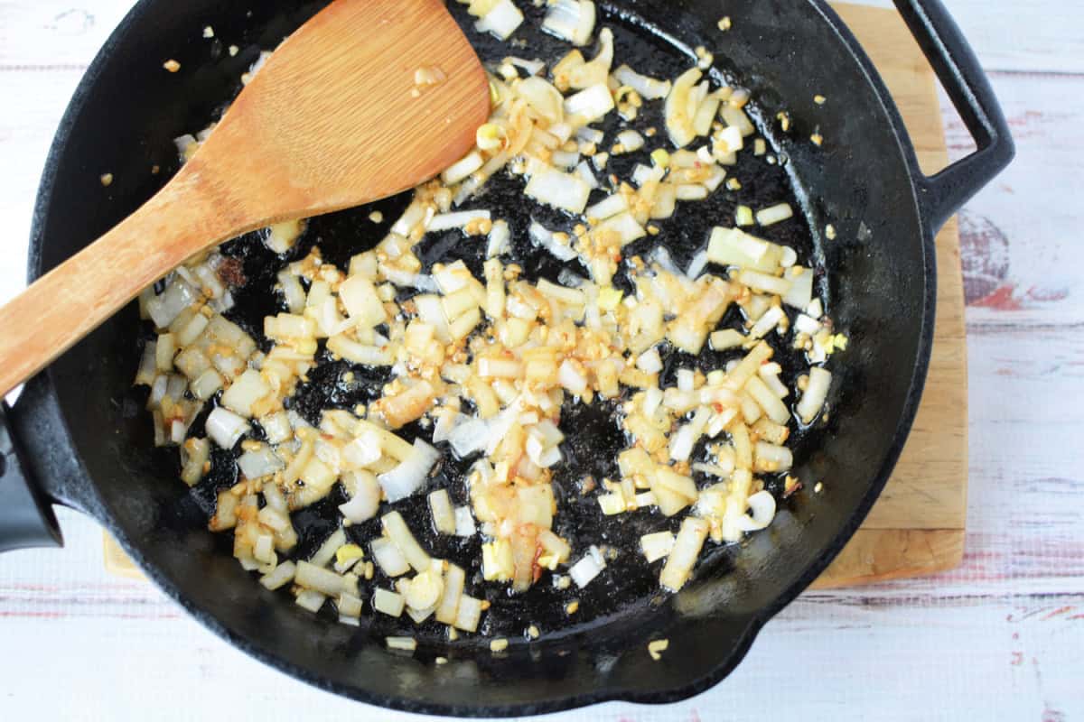 cooked onion and garlic in a pan