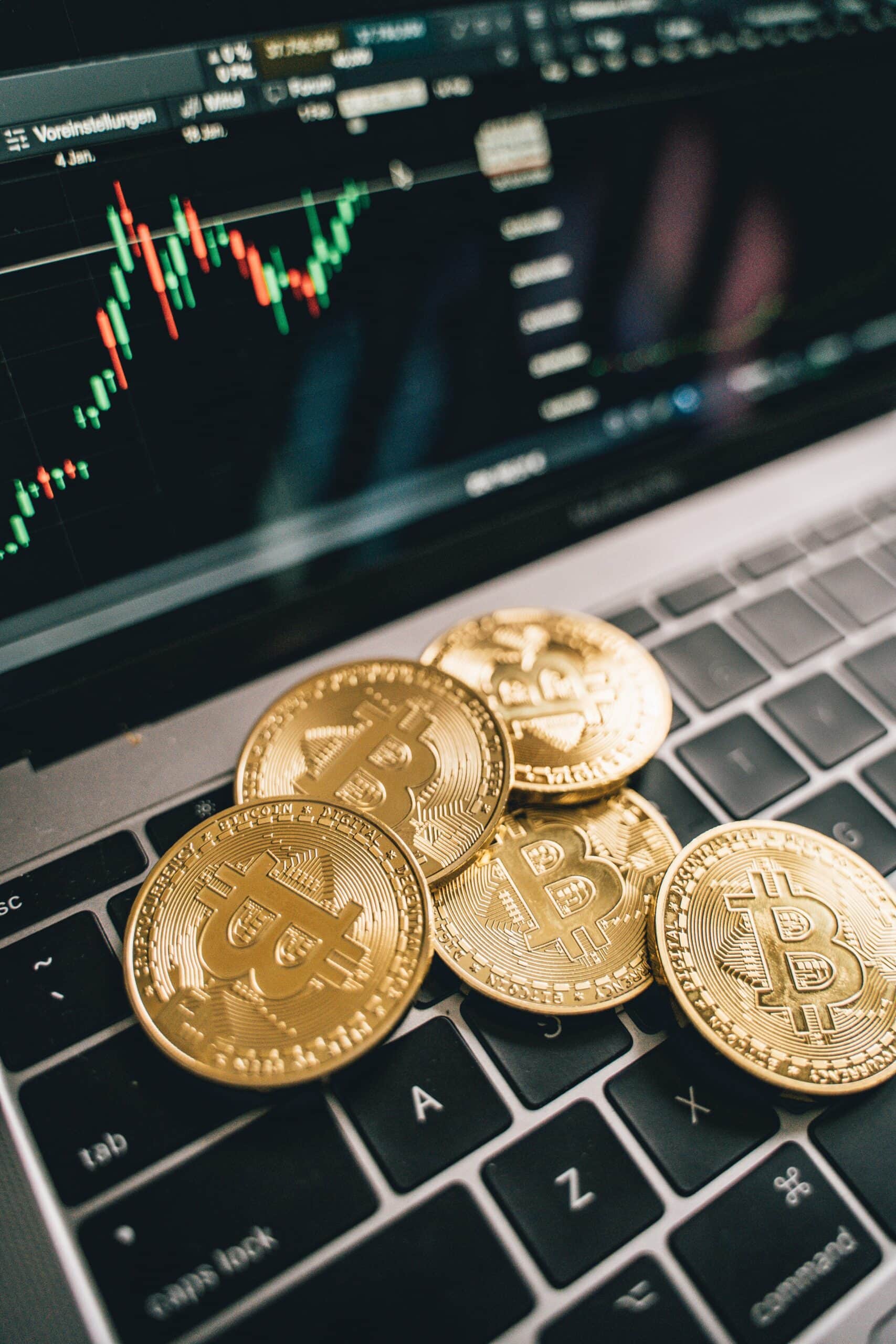 crypto on a laptop with bitcoins
