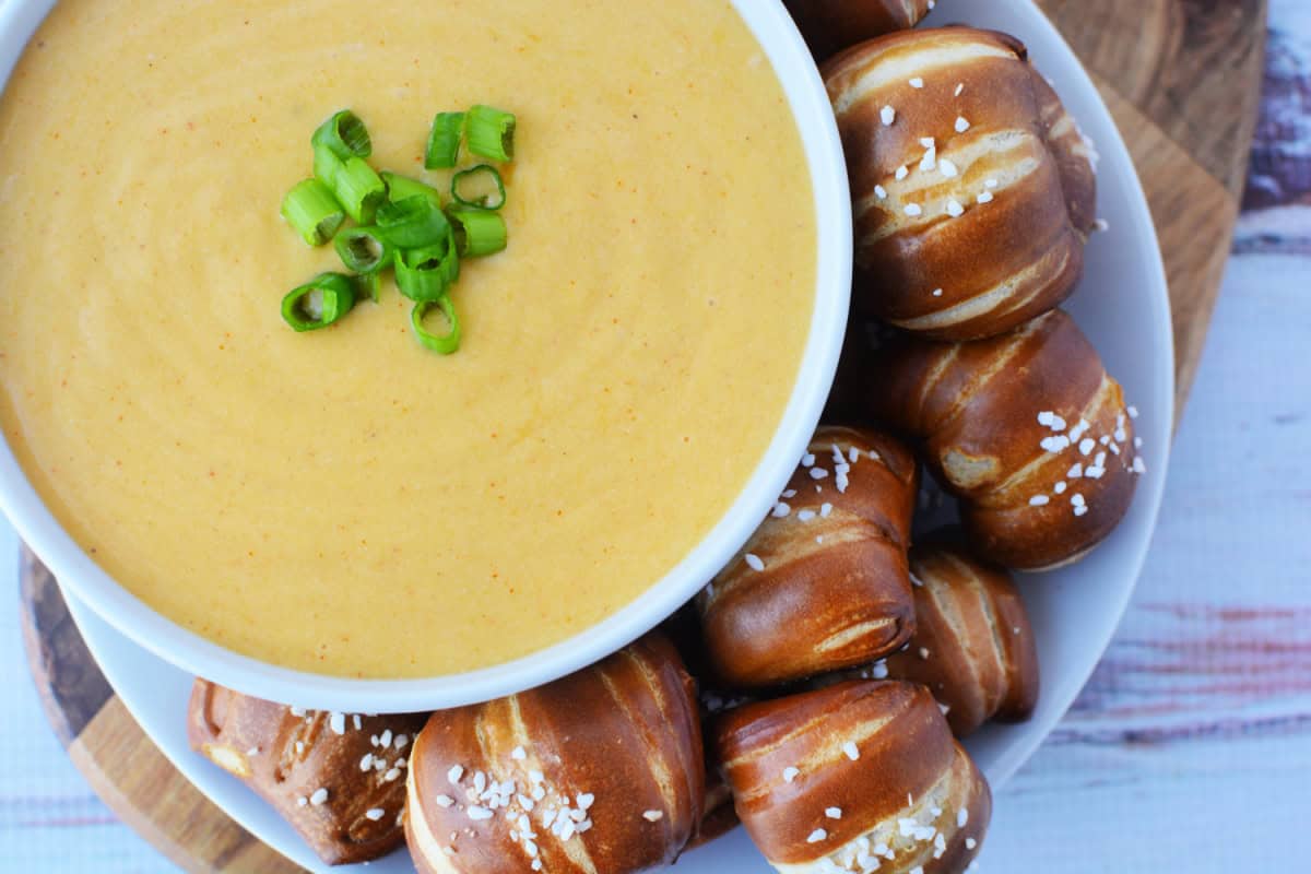 Beer Cheese Dip in a bowl with pretzels