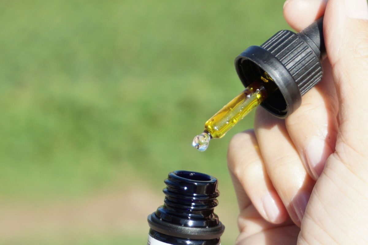 cbd oil in bottle with a dropper