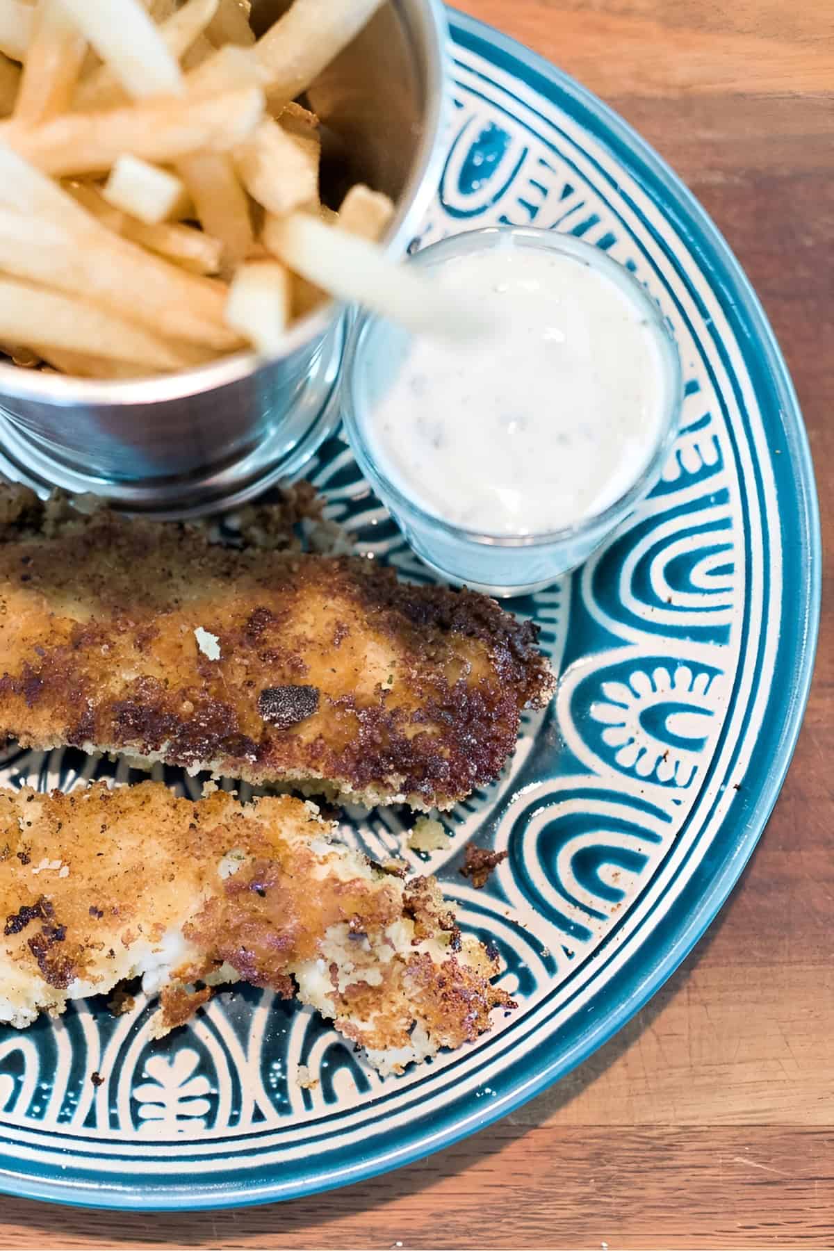 Homemade Chicken Strips on a blue plate