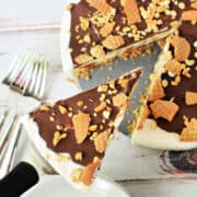 Close up shot of a Drumstick Ice Cream Cake with a slice cut out